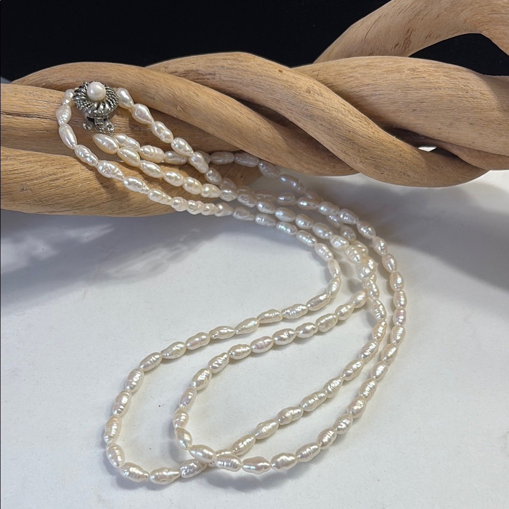 Elegant Fresh water White Multi-Strand Pearl Necklace
Silver clasp